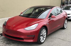 Tesla Model 3 parked, front driver side.jpg
